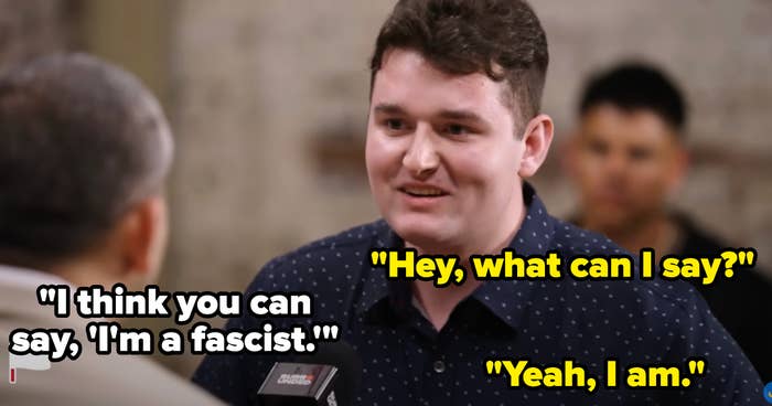 A person in a casual shirt responds humorously to a statement about fascism during a conversation
