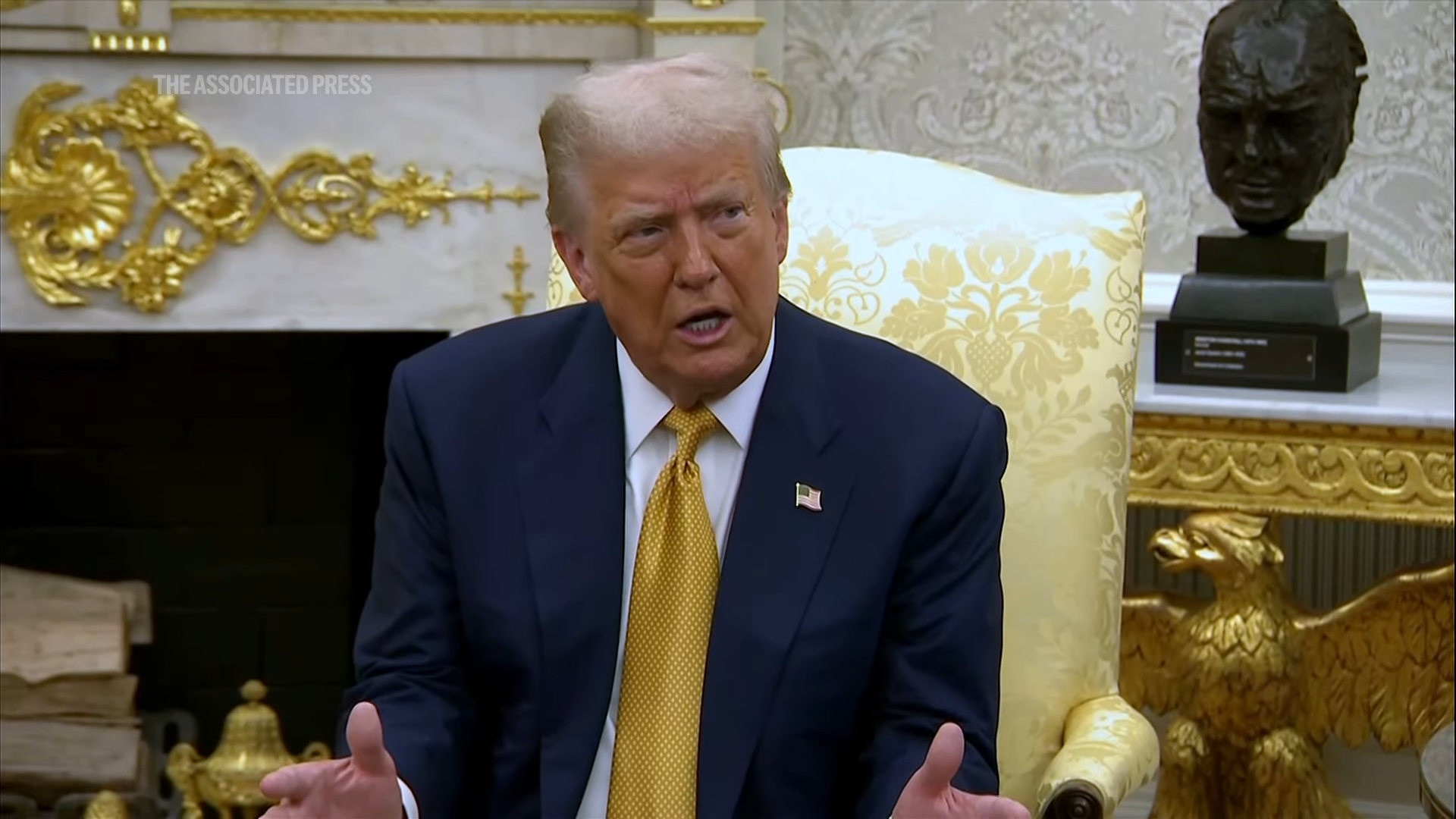 President Donald Trump talks in the Oval Office