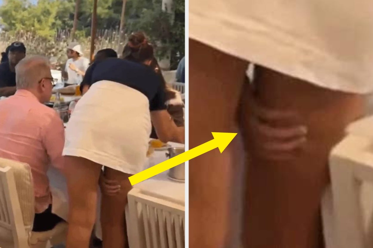Person wearing a short white skirt, reaching under their own skirt, with a yellow arrow highlighting the action at an outdoor dining table