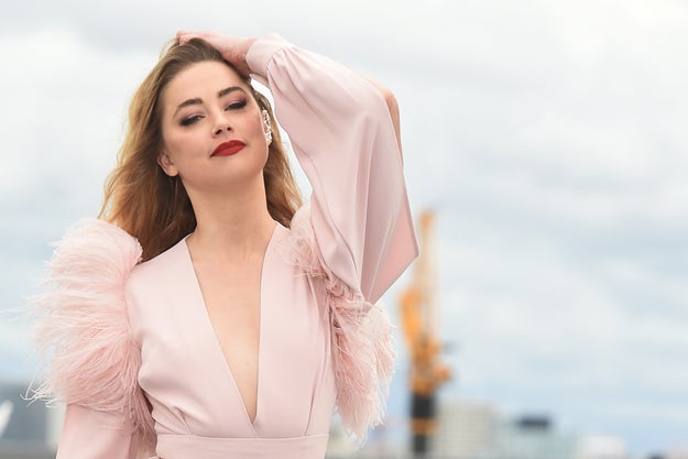 amber heard pink dress Amber Heard Wearing Alexander Mcqueen Dress Stock Photo 182557442