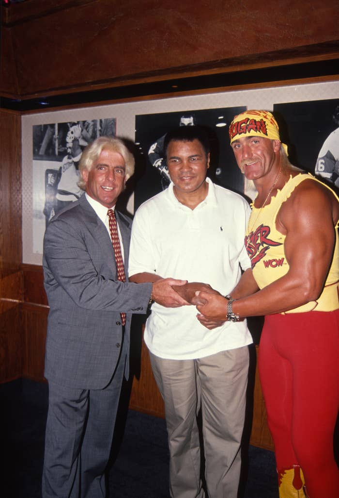 Ric Flair, Muhammad Ali, and Hulk Hogan pose for a photo