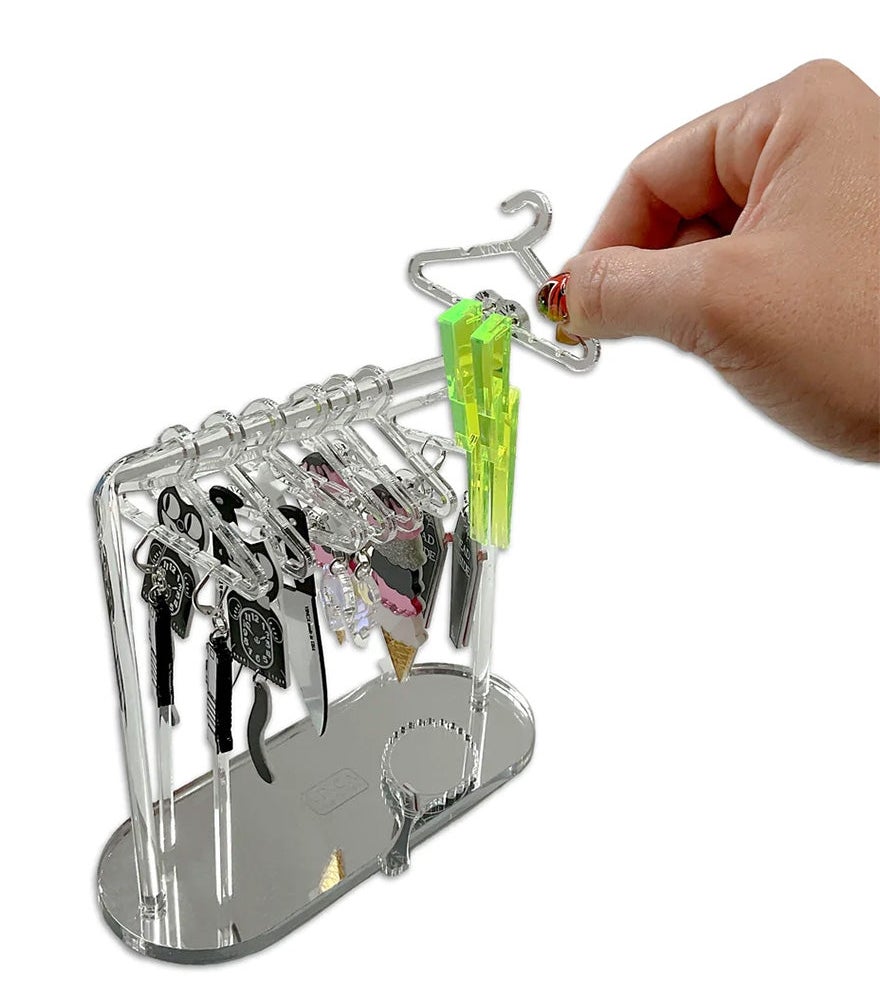 clear earring organizer shaped like mini clothing rack with hangers