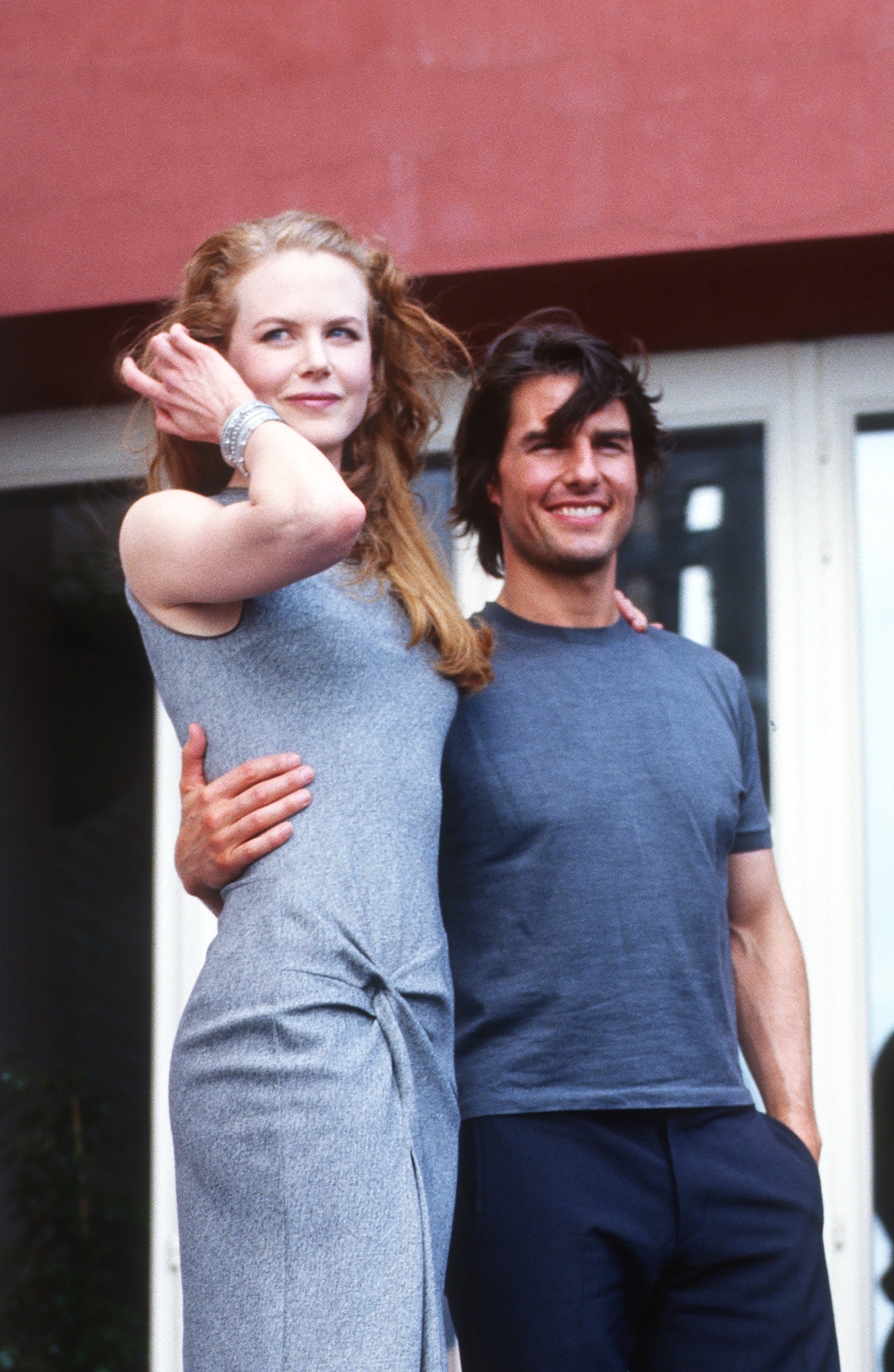 Nicole Kidman and Tom Cruise standing closely, smiling