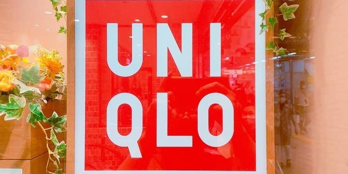 Storefront sign displaying "UNIQLO" in bold letters