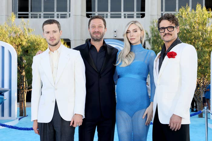 Pedro Pascal, Vanessa Kirby, Ebon Moss-Bachrach, and Joseph Quinn posing together on a red carpet for Fantastic Four