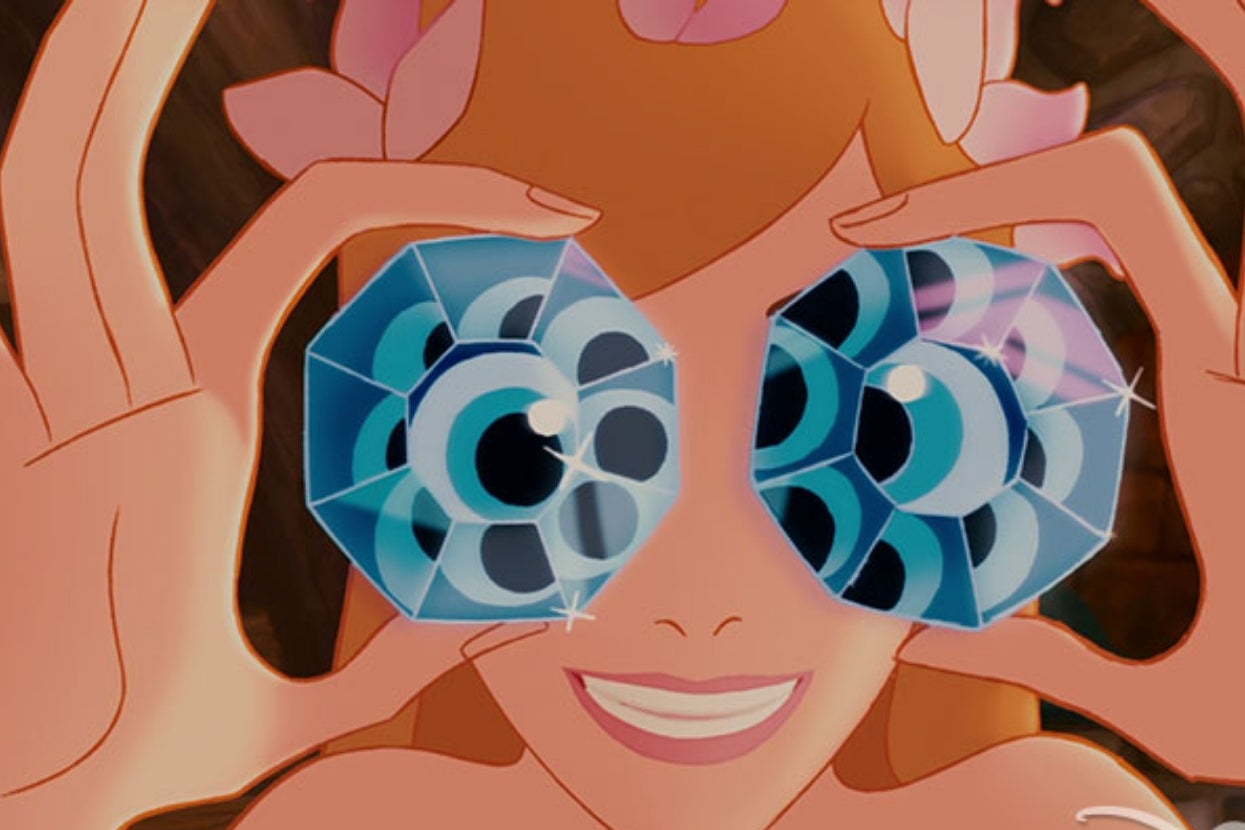 Animated character holds large jewel-like objects with eye designs over their own eyes, smiling widely