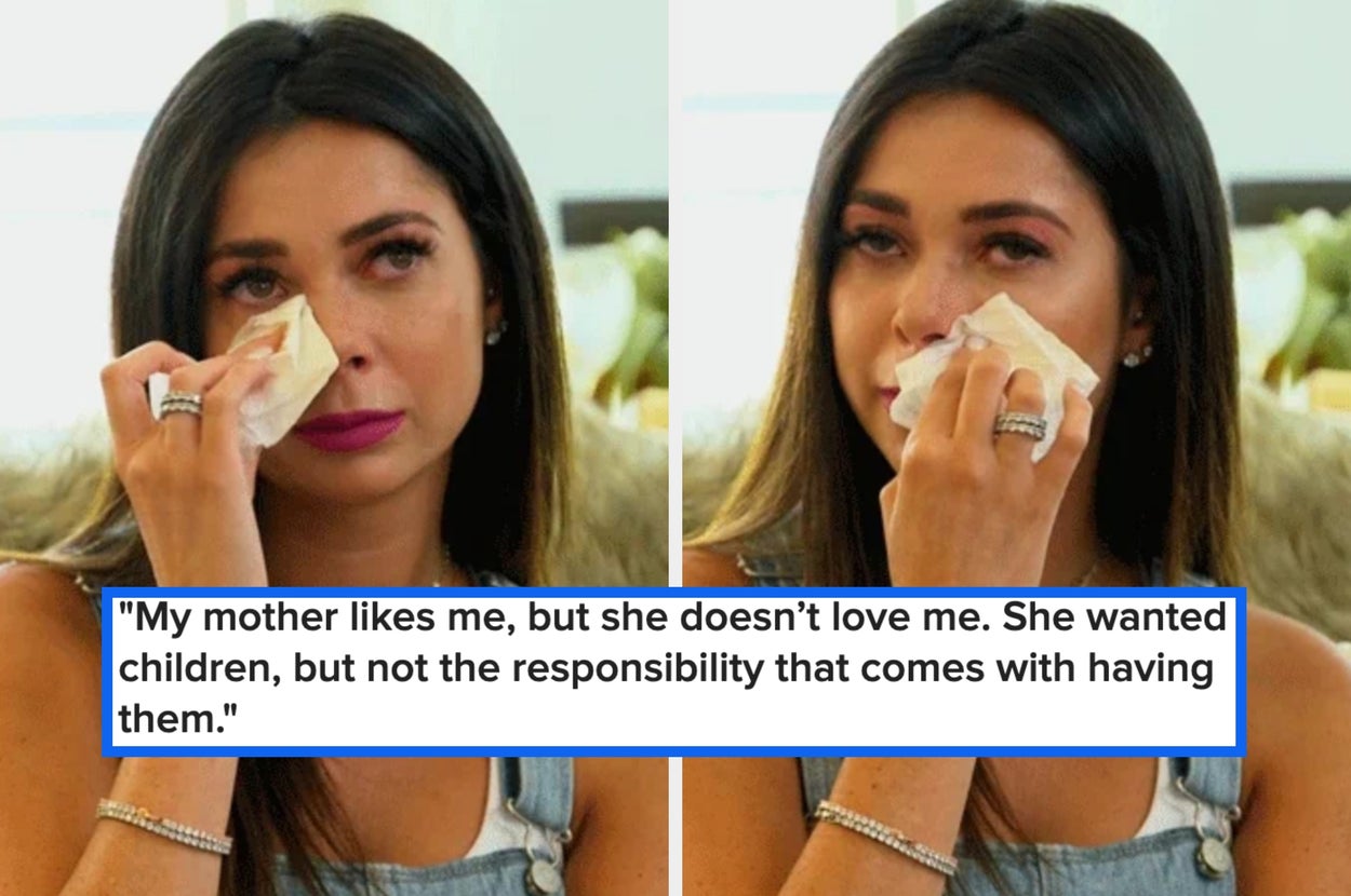 A woman with long hair wipes tears with a tissue. A text overlay quotes her expressing feelings of unsupported love from her mother