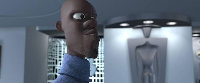 Animated character in a turtleneck looking serious, with futuristic interior in the background
