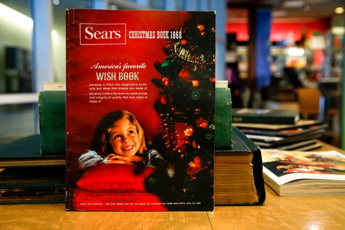 1968 Sears Christmas Wish Book cover featuring a smiling child beside a Christmas tree with gifts