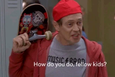 Man with skateboard over shoulder, wearing a red cap and hoodie, graphic t-shirt. Text reads: "How do you do, fellow kids?"