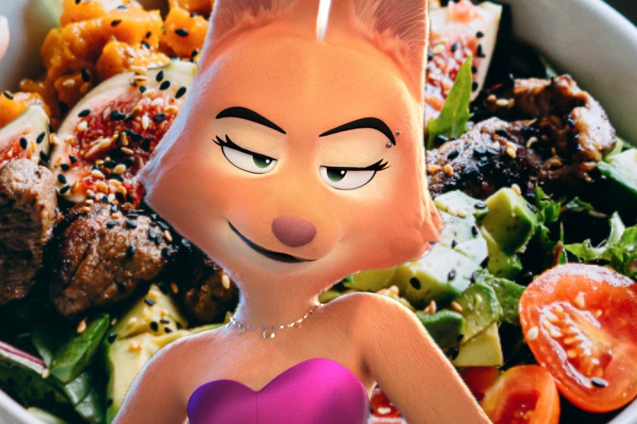 Animated character Diane Foxington from "The Bad Guys" with sly expression stands in front of a bowl of mixed greens, steak, and vegetables