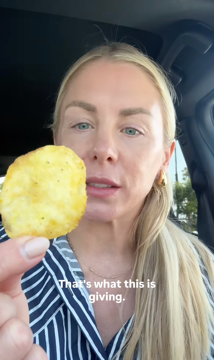 Person holding a potato chip inside a car with the text "That's what this is giving" written on the image