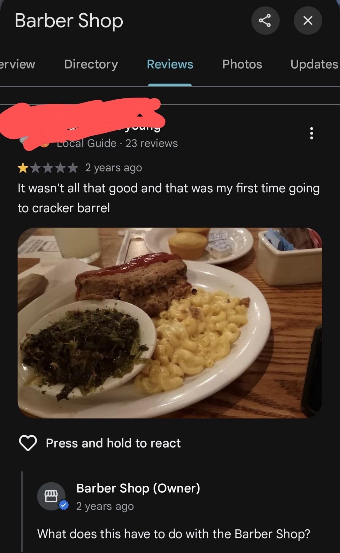 Screenshot of a negative review for a barber shop about a bad meal at "cracker barrel." Owner responds, questioning its relevance to the barber shop