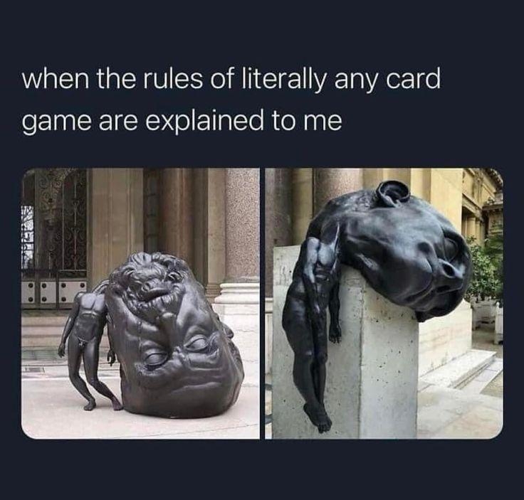 Sculptures show a distorted figure and a head slumped over a block. Text expresses confusion when learning card game rules