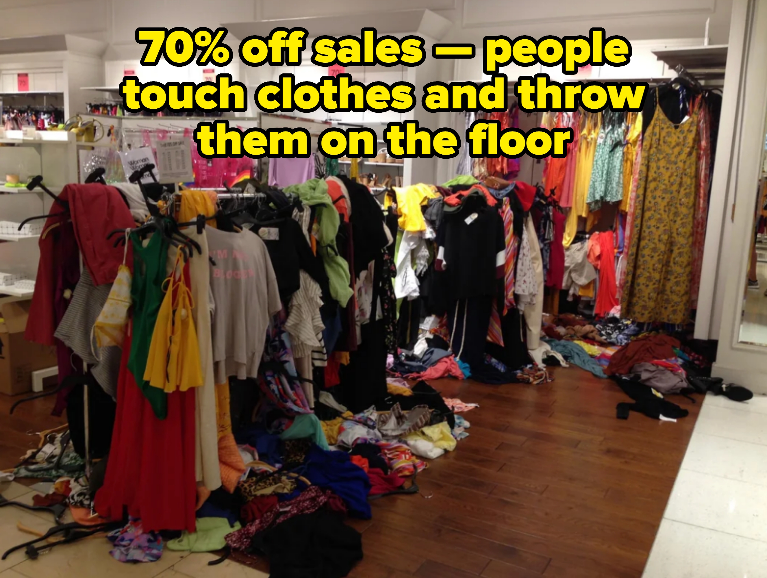 Clothes are scattered in disarray across a shopping area, with racks of garments in the background. Caption: &quot;70% off sales — people touch clothes and throw them on the floor&quot;