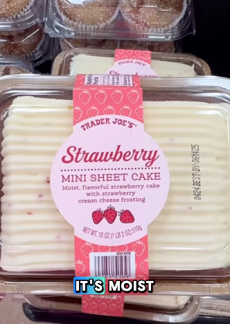 Trader Joe's Strawberry Mini Sheet Cake with strawberry cream cheese frosting in packaging. Caption reads "It's moist."