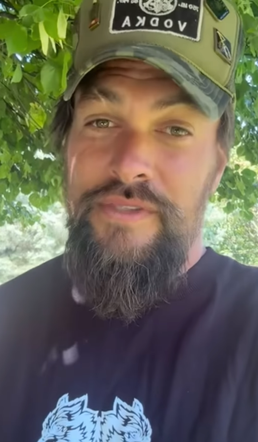 Jason Momoa with a beard speaking in an Instagram video