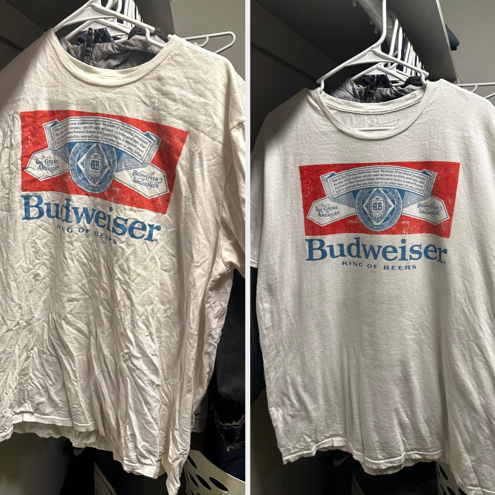 Two white T-shirts with a Budweiser logo hang in a closet. Both shirts have a vintage, slightly worn appearance