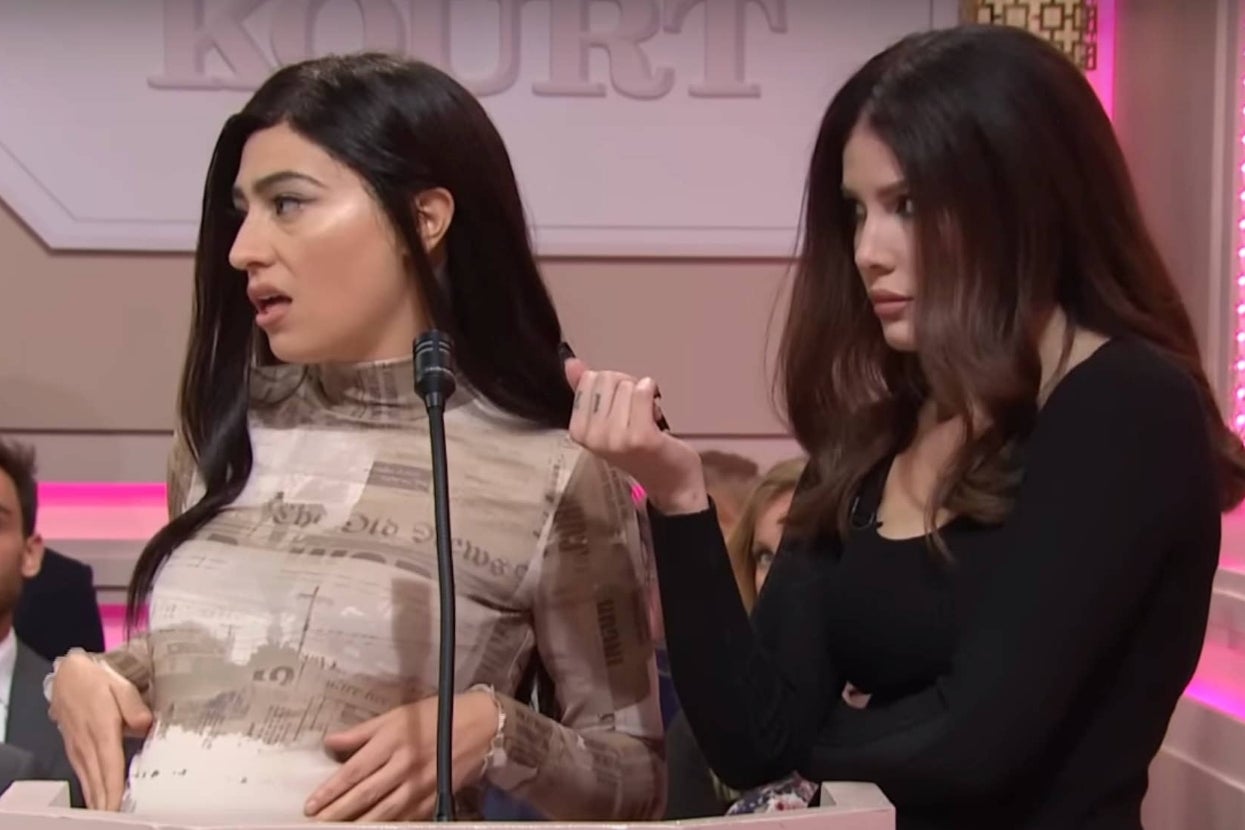 Melissa Villaseñor and Halsey dressed as Kardashian-Jenners on a court room show sketch set