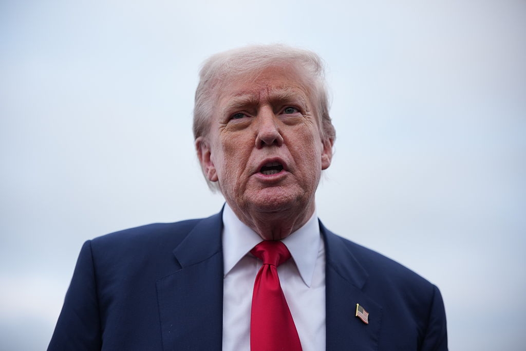 President Donald Trump speaks to the media as he arrives at Glasgow Prestwick Airport on July 25, 2025 in Prestwick, Scotland