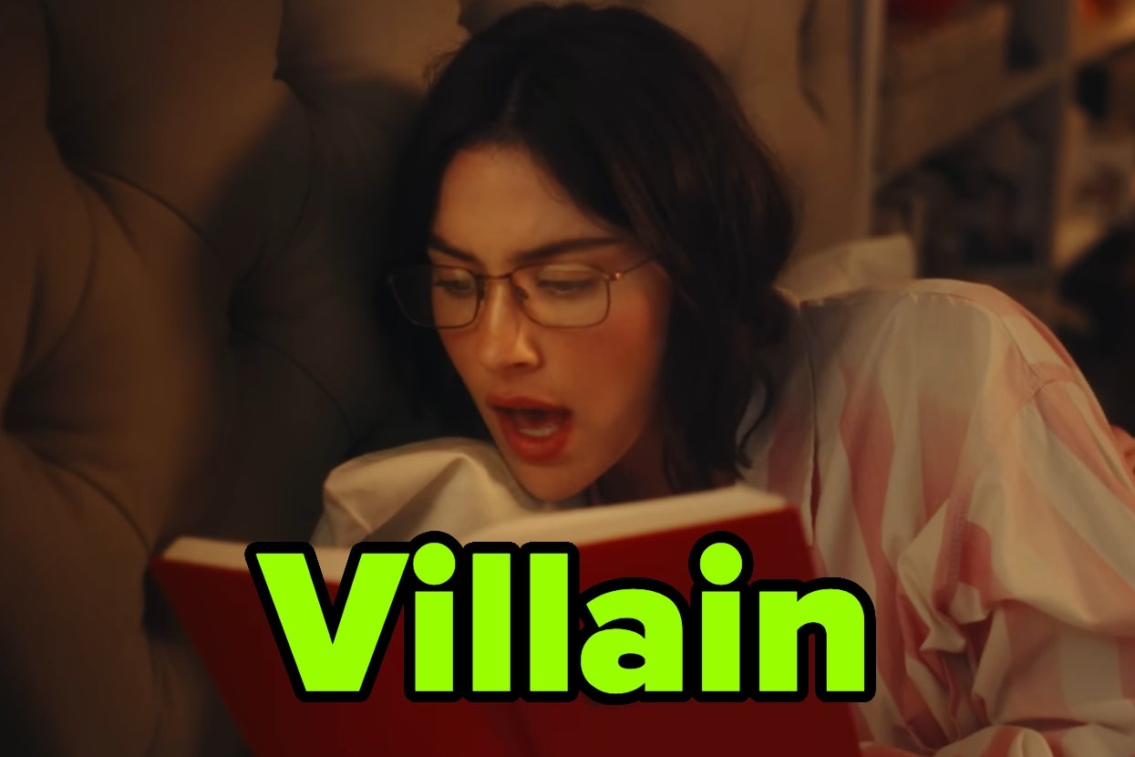 Gracie Abrams in glasses and pajamas reading a red book with "Villain" in bold text overlay