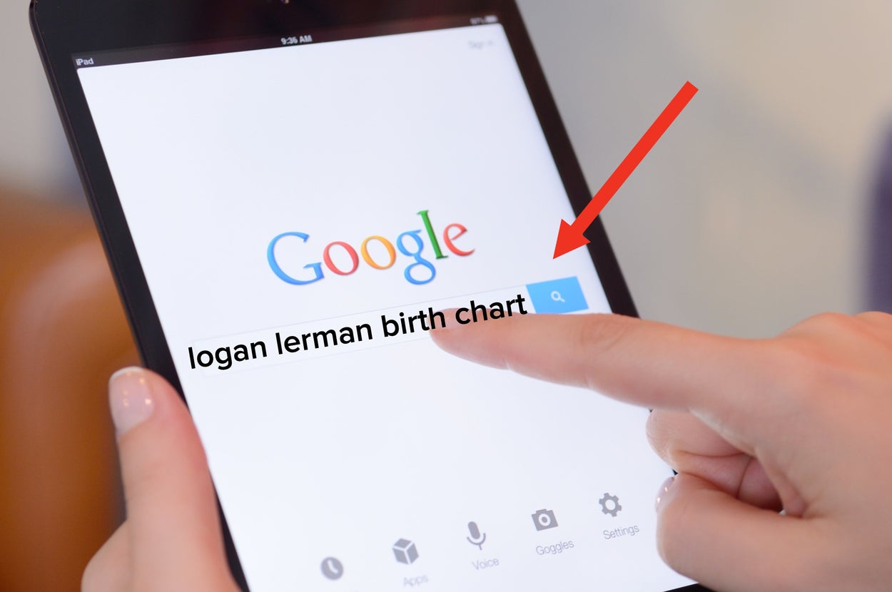 A hand is using a tablet, accessing the Google search homepage and searching for logan lerman birth chart