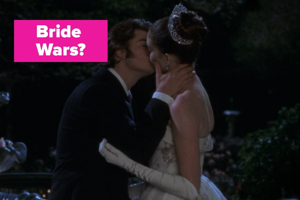 A person in a tuxedo kisses another wearing a strapless gown and tiara. Pink text reads "Bride Wars?"