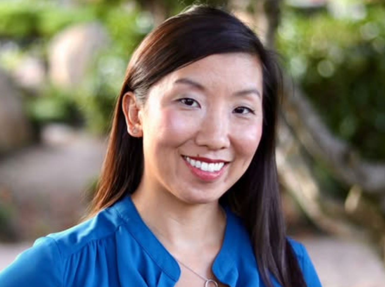 Dietician Maggie Moon smiling in blue shirt