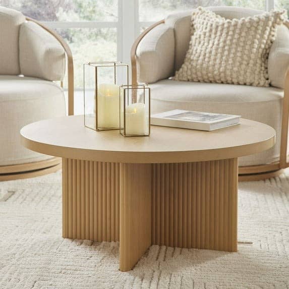 Modern circular java array with ribbed base.