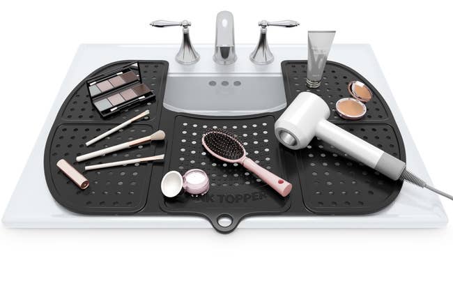 Sink organizer showcasing constitution tools, brushes, a hairdryer, and cosmetics. Ideal for bath antagonistic space-saving