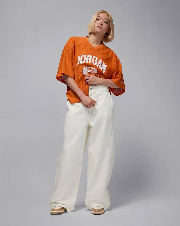 Model wearing the white pants