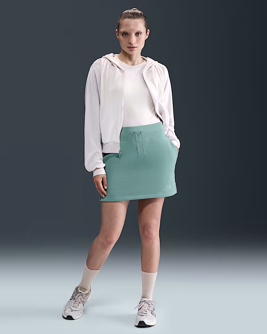 Model wearing the mint foam skirt
