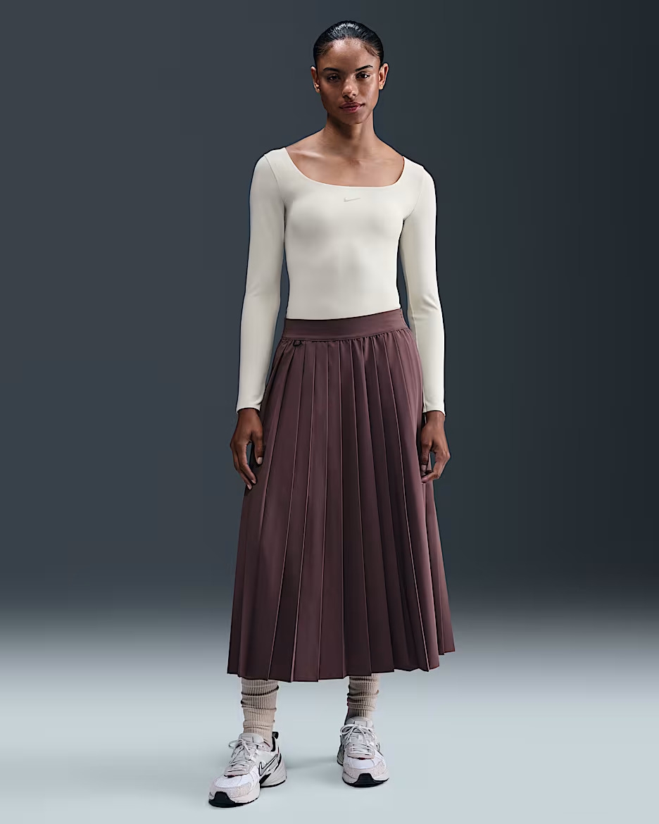 Model wearing the cream bodysuit