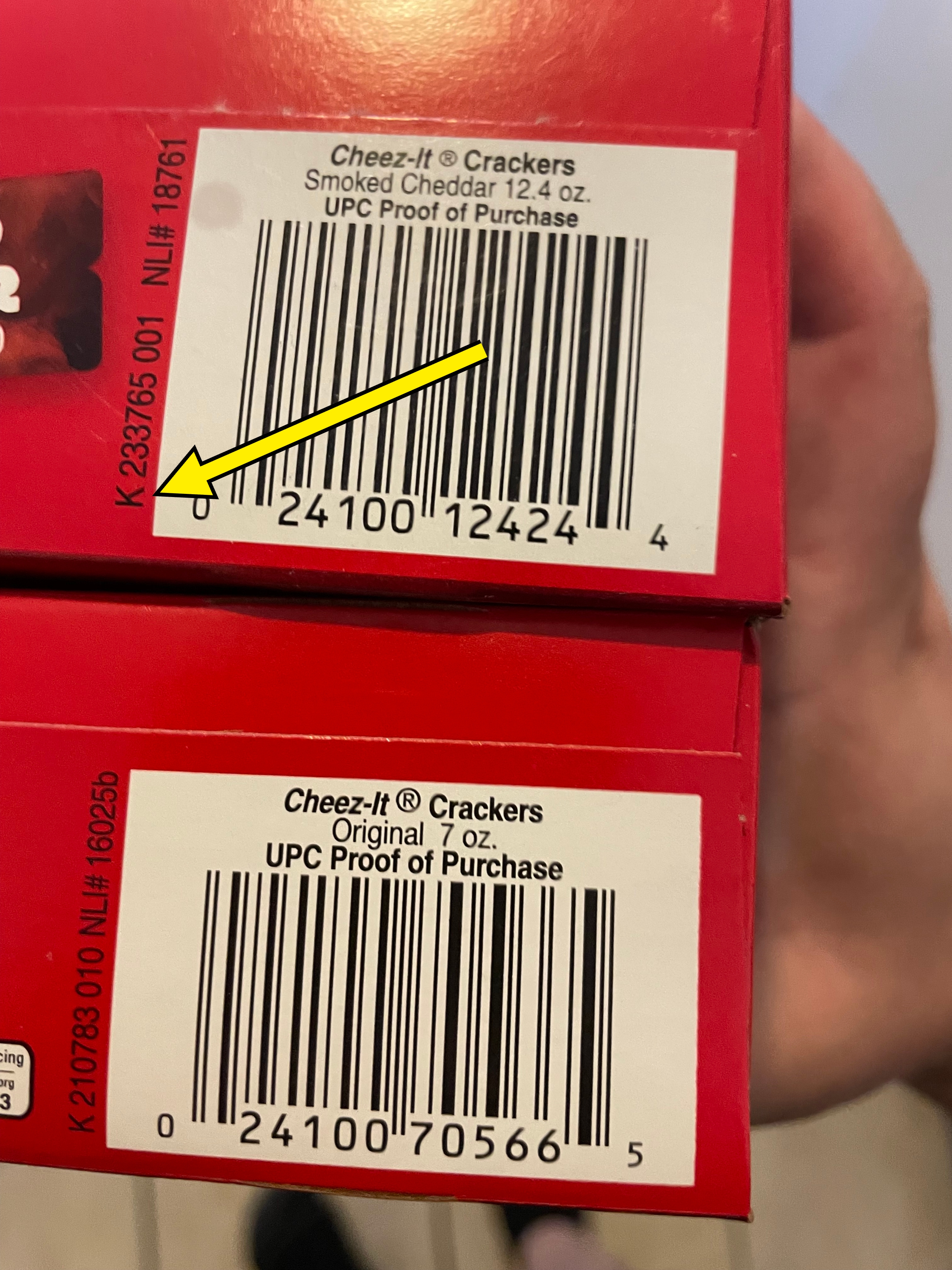 Two barcode labels for Cheez-It Crackers: one for Smoked Cheddar 12 oz and one for Original 7 oz, showing UPC codes