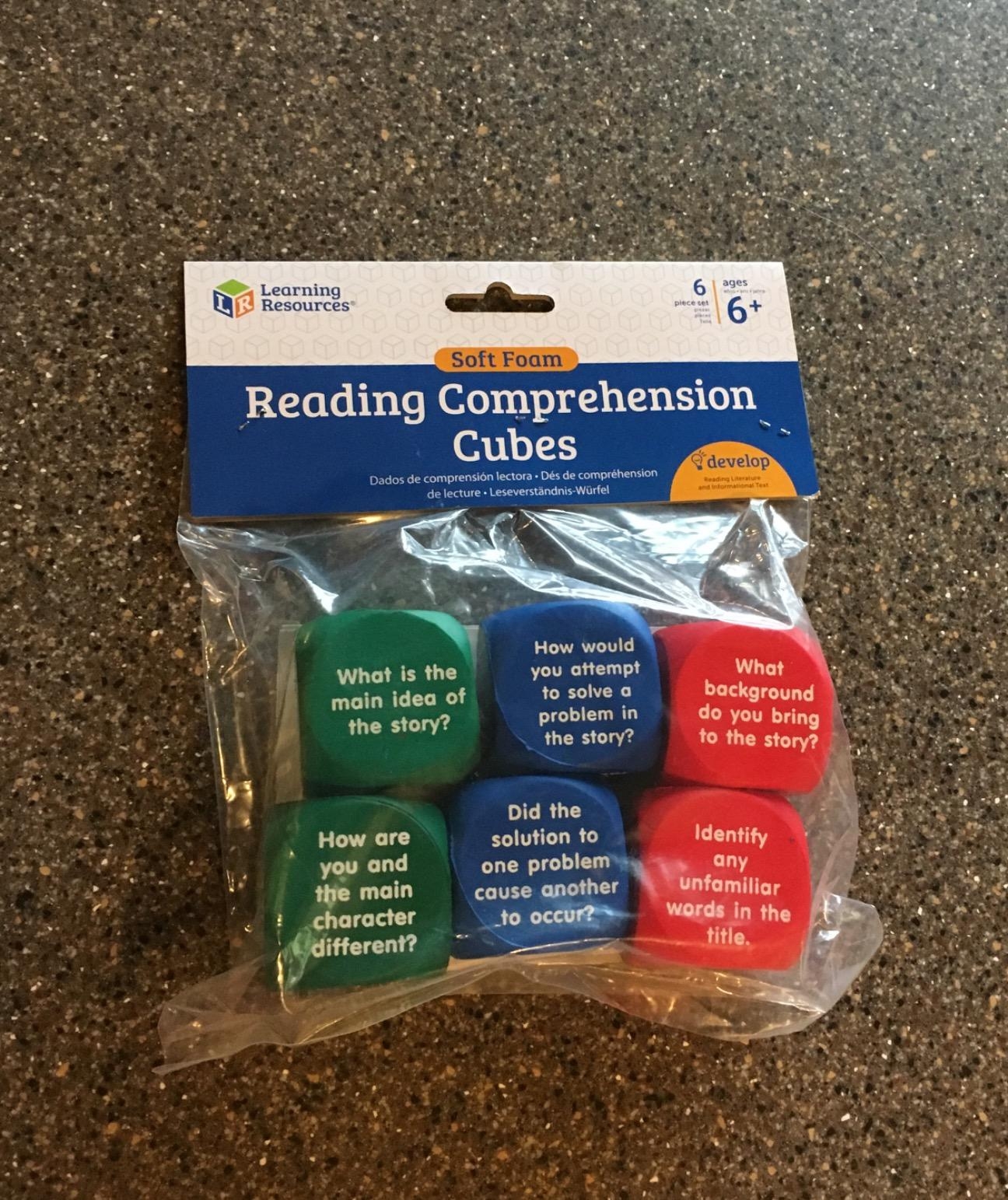 Pack of soft foam reading comprehension cubes with questions, designed for improving story analysis skills for children aged 6 and up
