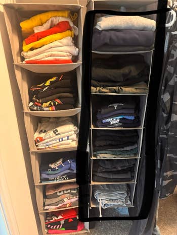 Clothes organized successful  stacked shelves, including folded t-shirts and jeans, perfect  for businesslike  wardrobe storage