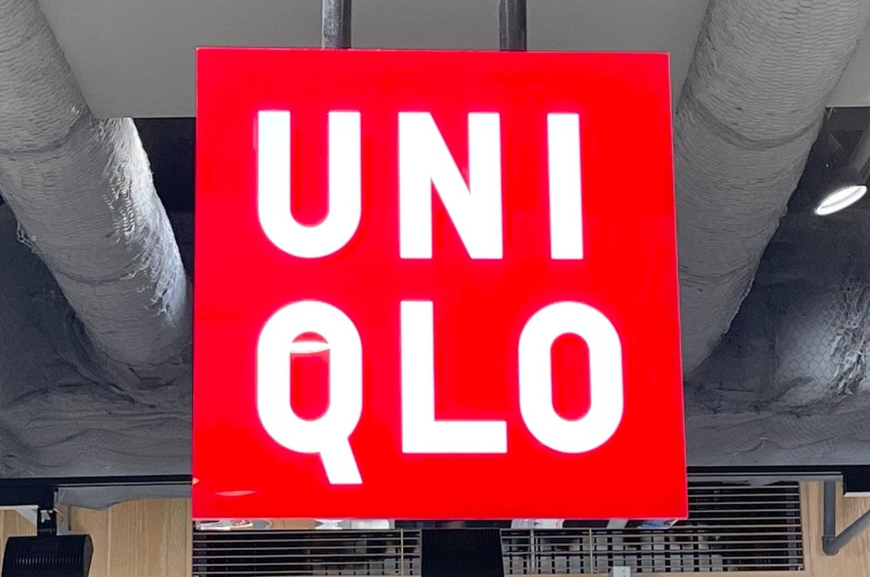 Uniqlo store interior with a prominent ceiling sign