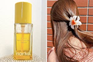 ボトル入りのヘアエッセンス製品が棚に置かれている。