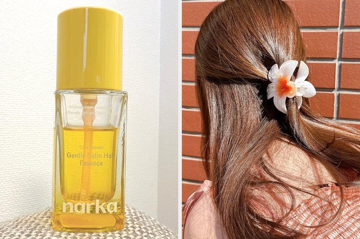 ボトル入りのヘアエッセンス製品が棚に置かれている。