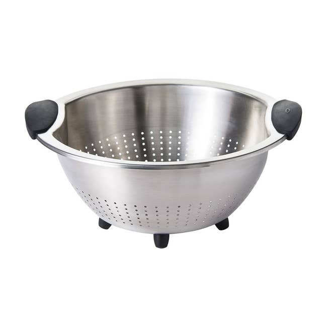 Stainless alloy  colander with achromatic  rubber handles and feet, perfect  for draining pasta and washing produce