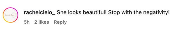 Comment praising a woman's beauty and urging others to stop negativity