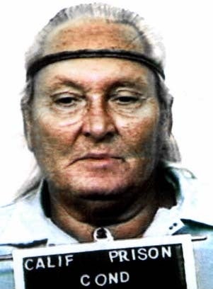 I don’t cognize who this is, but the representation shows a mature idiosyncratic with agelong hair, wearing a situation uniform, holding a sign