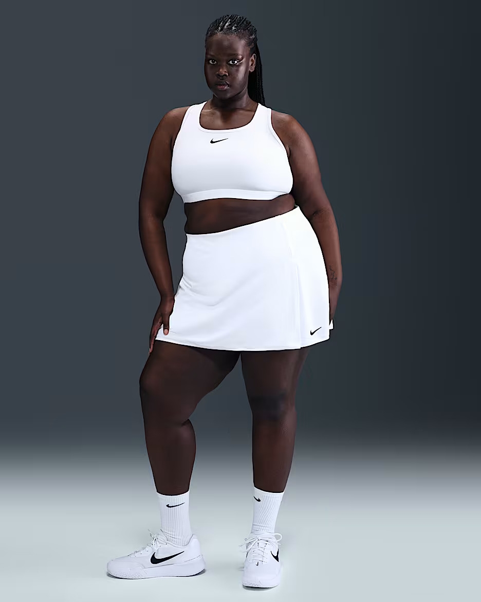 Model wearing the white skirt