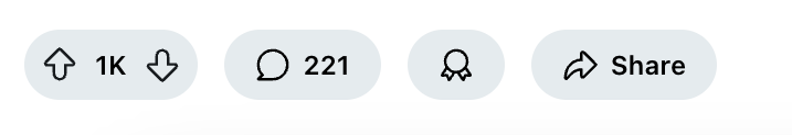 Four icons: upvote with "1K", comment with "221", a badge, and a share arrow
