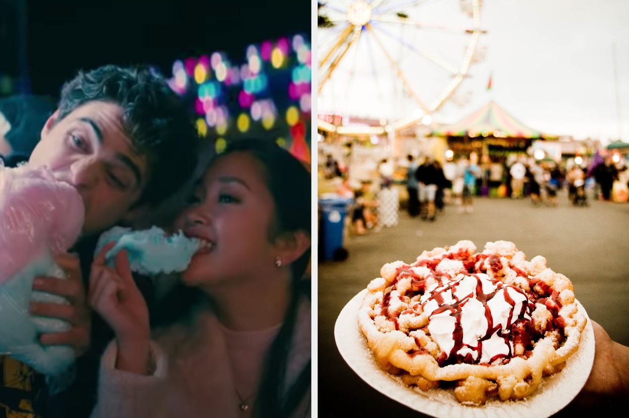 Two people eating cotton candy at a fair; a funnel cake with toppings is nearby. Bright lights and a Ferris wheel are in the background