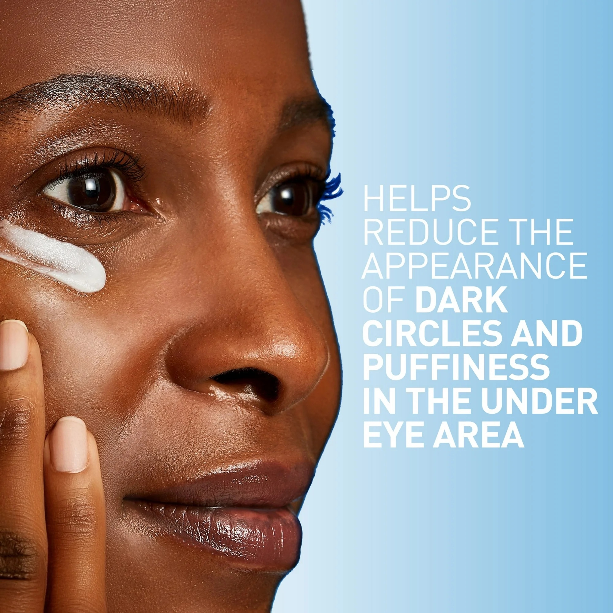 A person applies cream under their eye. Text highlights benefits: reduces dark circles and puffiness.