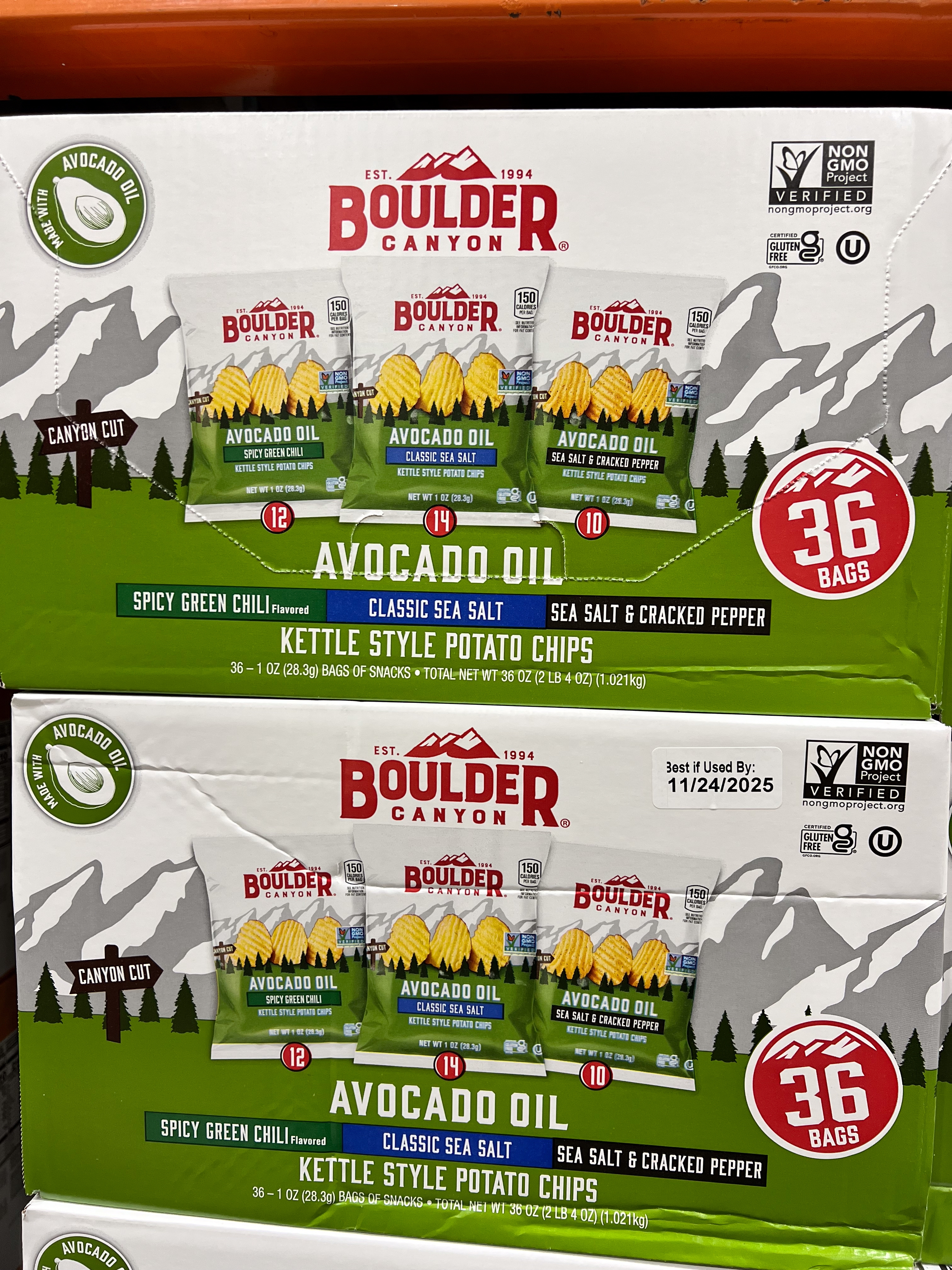 Boxes of Boulder Canyon potato chips featuring three flavors: Spicy Green Chile, Classic Sea Salt, and Sea Salt & Cracked Pepper, 36 bags total