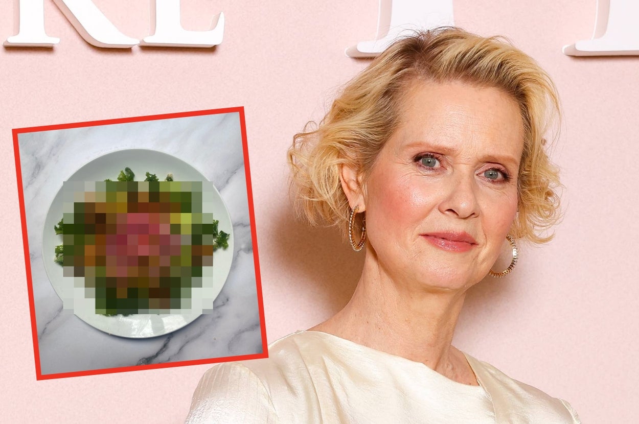 Person with short hair in elegant attire poses beside a blurred image of a dish, suggesting a culinary theme or event