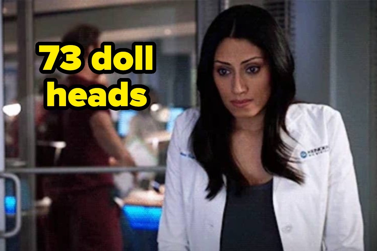A person wearing a white lab coat looks concerned. Text reads, "73 doll heads."