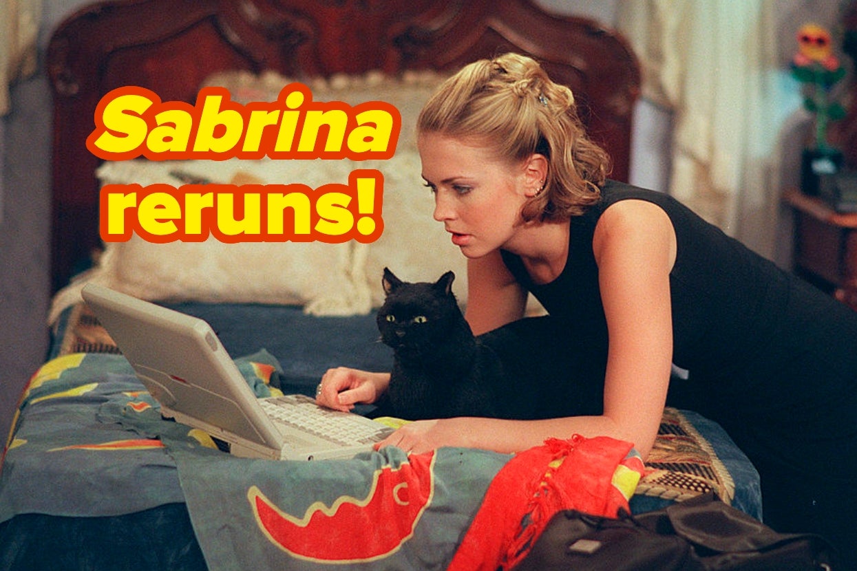 Sabrina the Teenage Witch using laptop on bed with a black cat beside her; text reads "Sabrina reruns!"